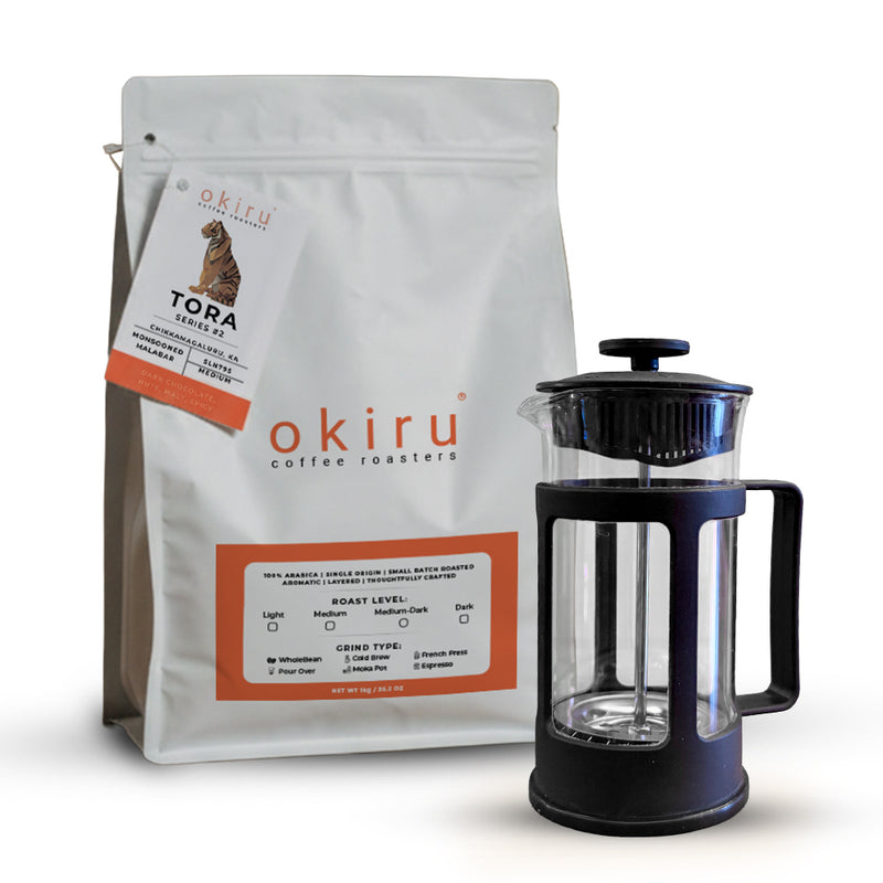 okiru coffee roasters TORA package with a French press on a white background
