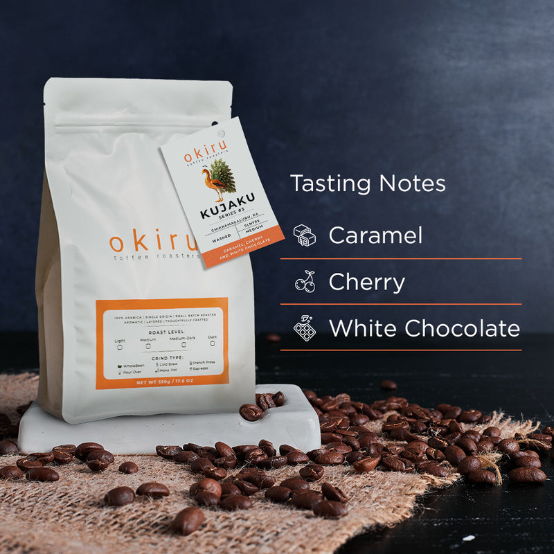 Kujaku coffee bag with tasting notes on a dark background