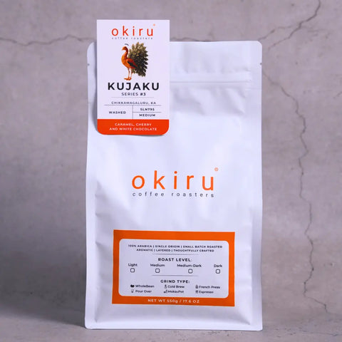 okiru coffee roasters packaging on a gray background with label kujaku 